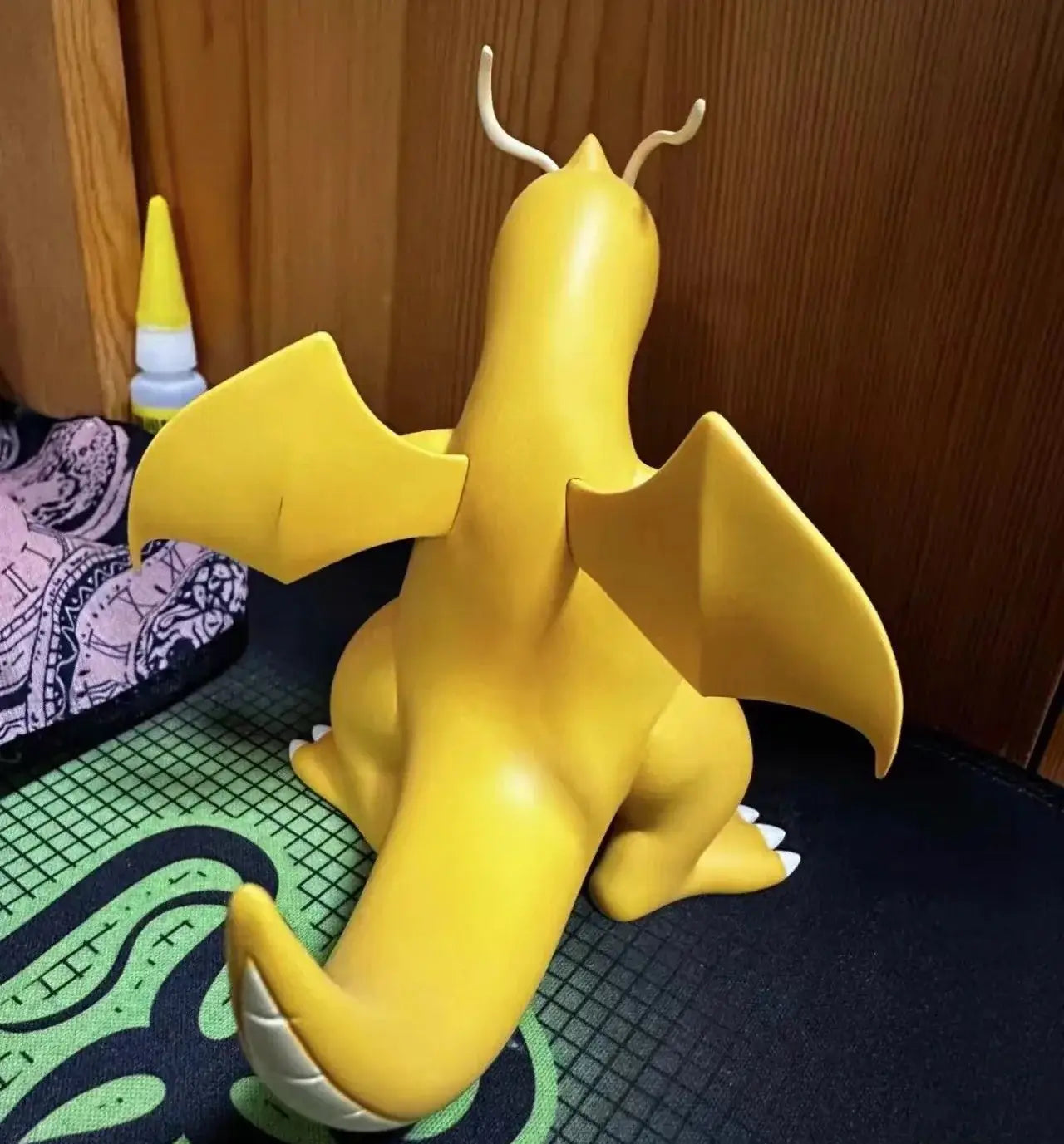 Pokemon Dragonite action figure featuring a detailed yellow design with wings, perfect for collectors and kids.