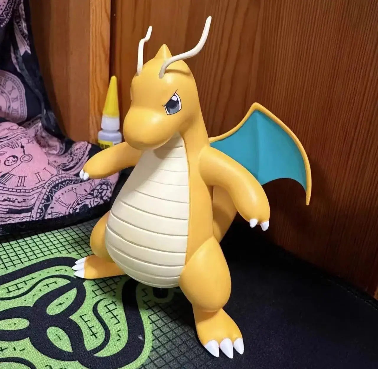 Pokemon Dragonite action figure standing pose, 12cm durable PVC statue, ideal for kids and collectors.