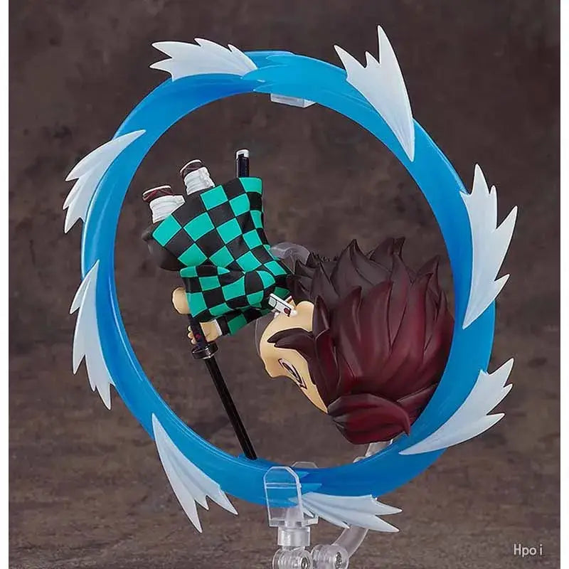 Nendoroid Kamado Tanjirou 1193 action figure showcasing dynamic pose with blue circular effect.