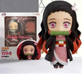 Nendoroid Kamado Nezuko 1194 figure with packaging, showcasing detailed design and vibrant colors.