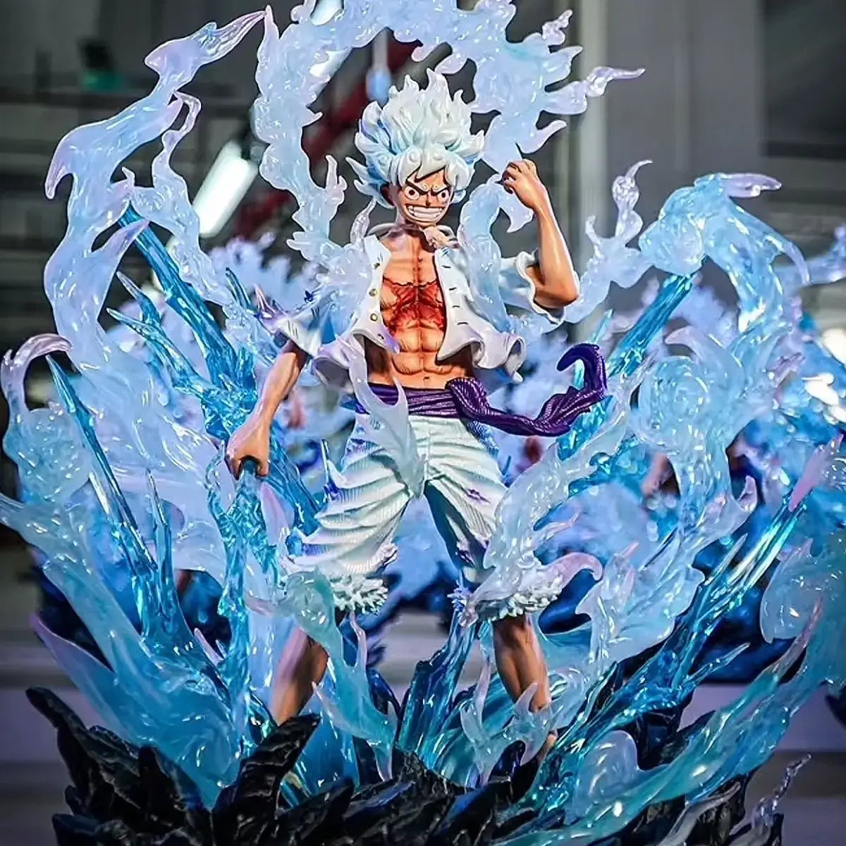 One Piece Luffy Anime Figure surrounded by swirling blue energy effects, showcasing intricate details.