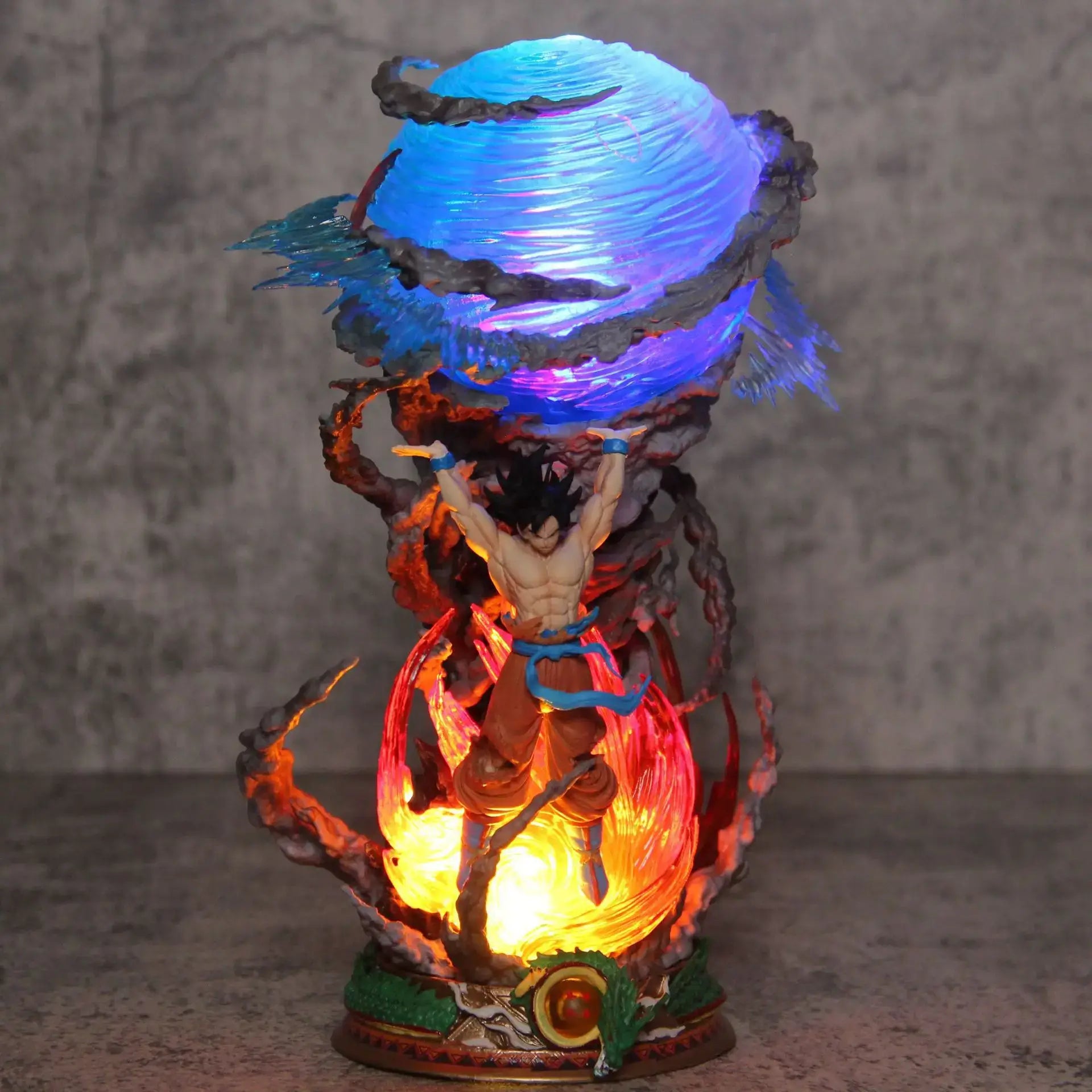 25cm Goku Dragon Ball PVC figure in Spirit Bomb action pose with vibrant LED lighting effects