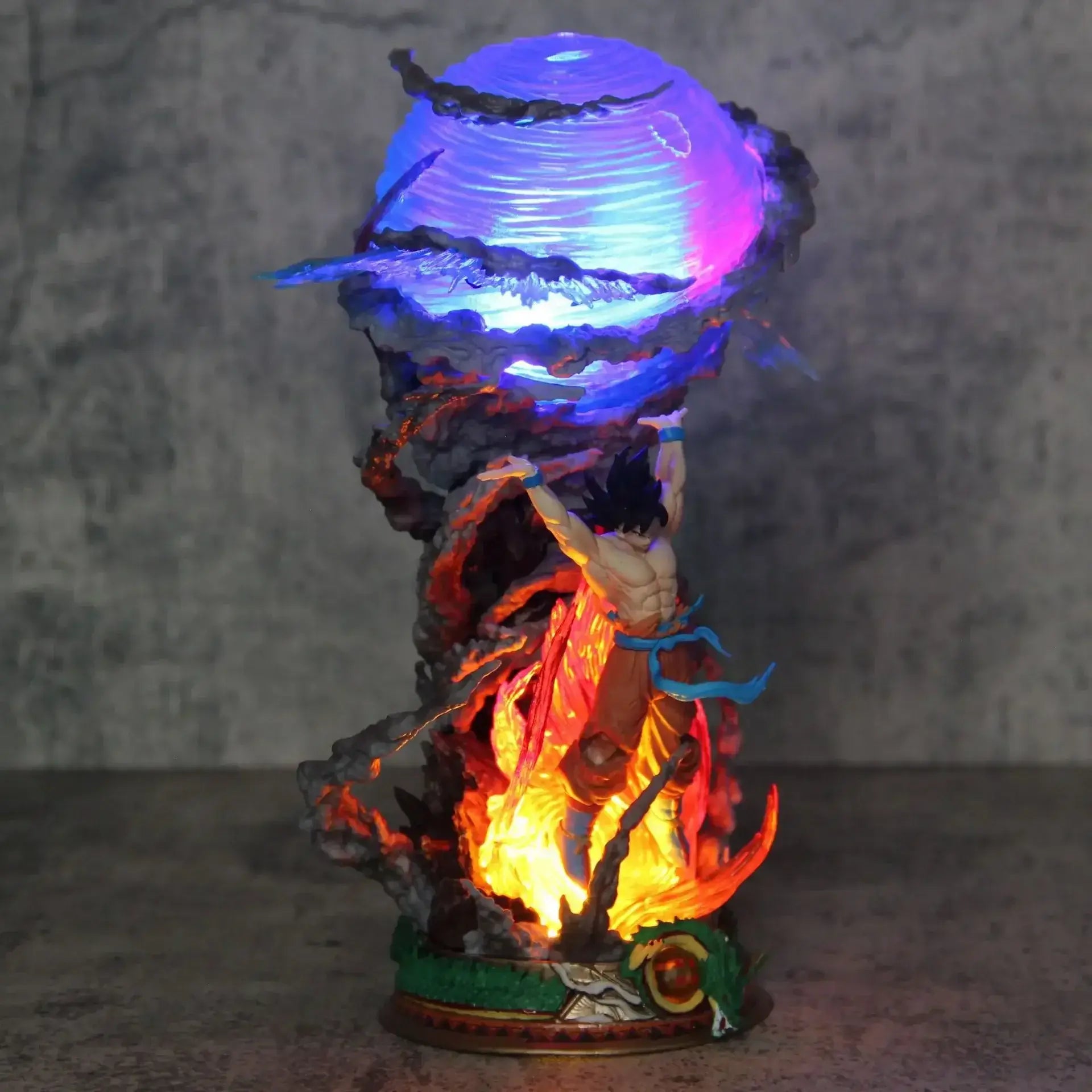 Goku Dragon Ball PVC figure with illuminated display, showcasing iconic character in dynamic pose, perfect for collectors.