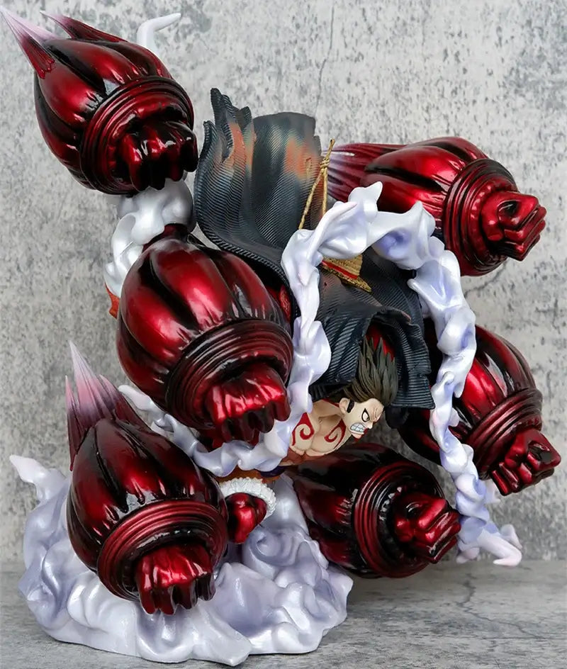 One Piece Luffy Gear Fourth action figure showcasing powerful, dynamic pose with red energy bursts.