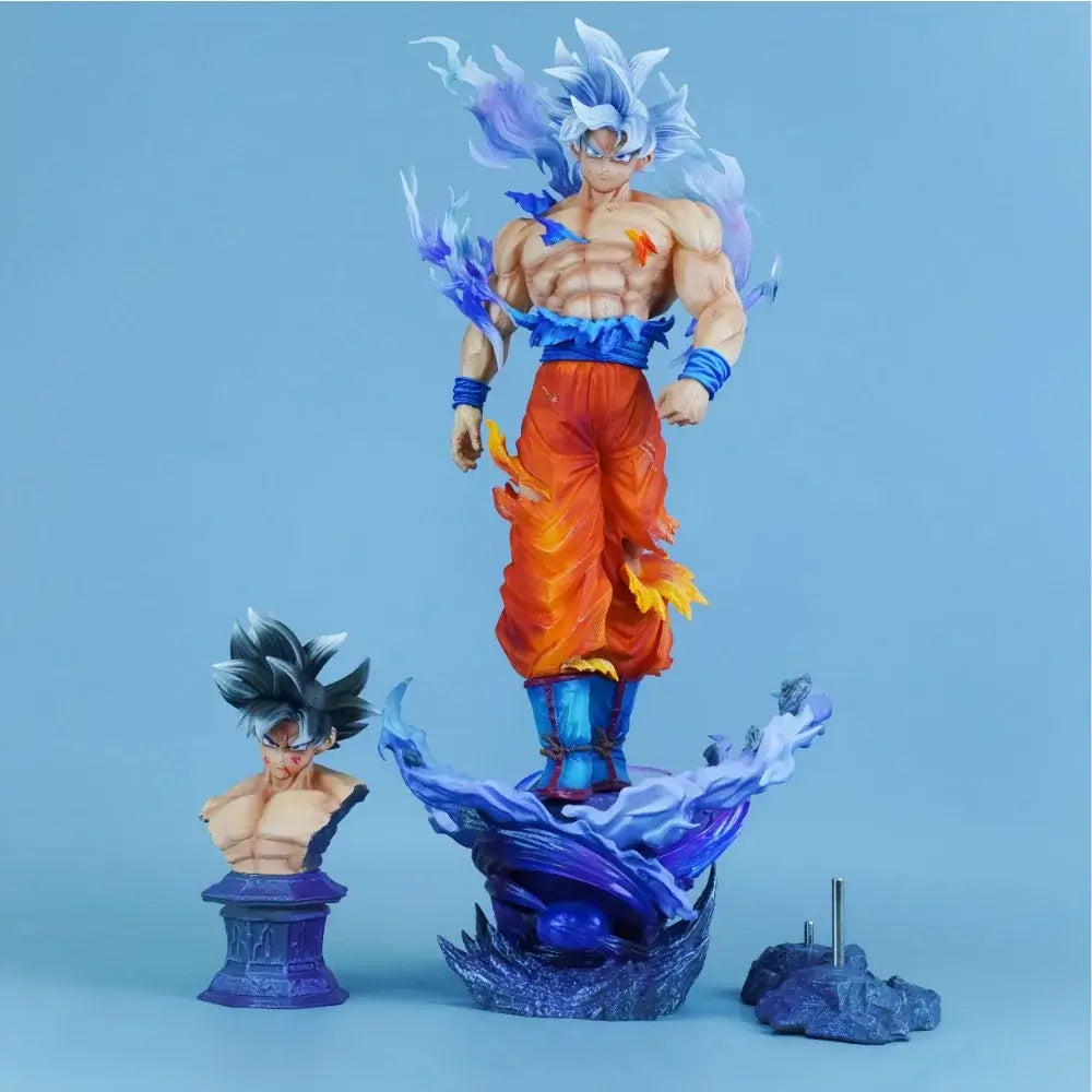 Ultra Instinct Goku action figure display with detailed sculpt and vibrant colors on a blue background.