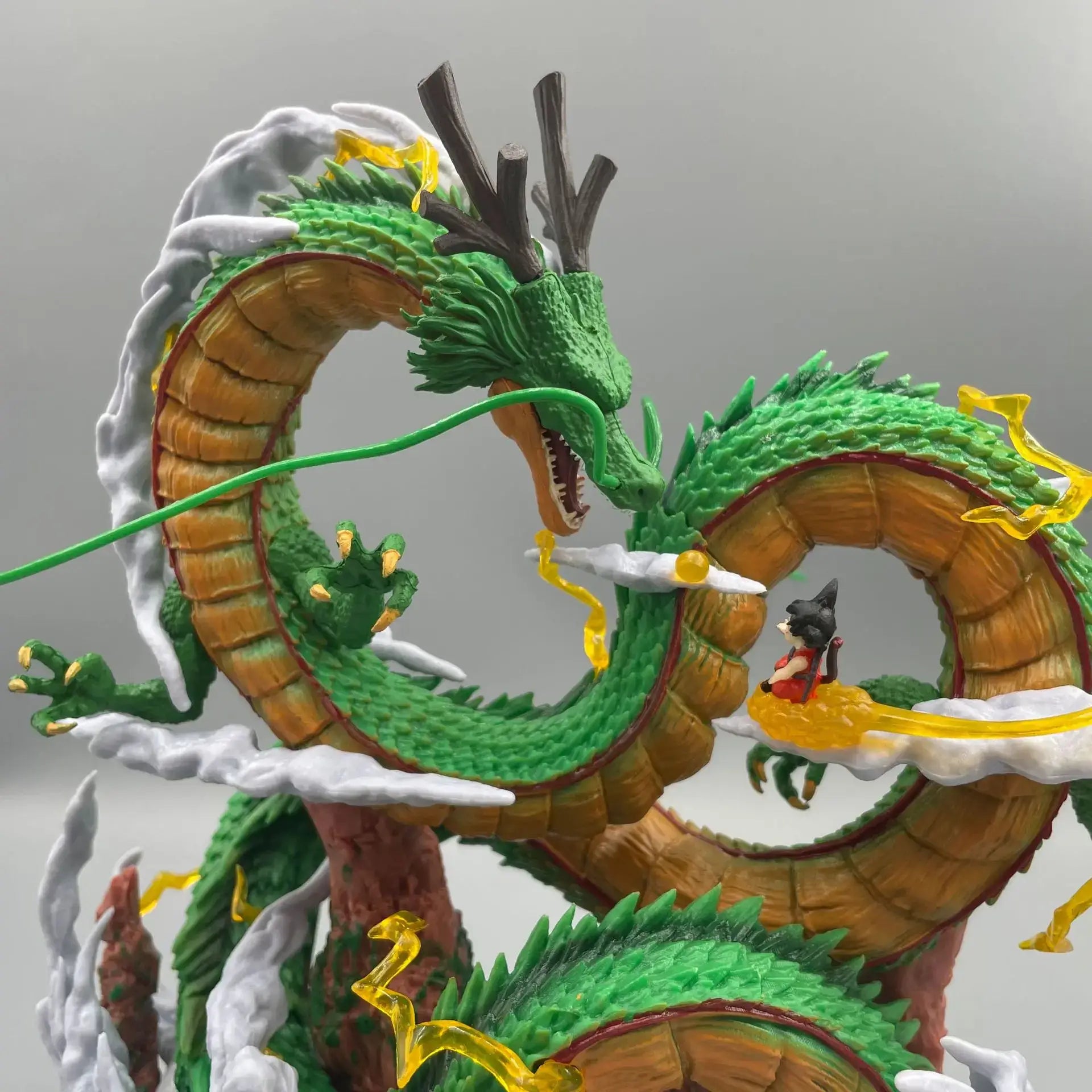24cm Dragon Ball Goku Shenron figure featuring Shenron coiling with Goku. Detailed PVC figurine for collectors.