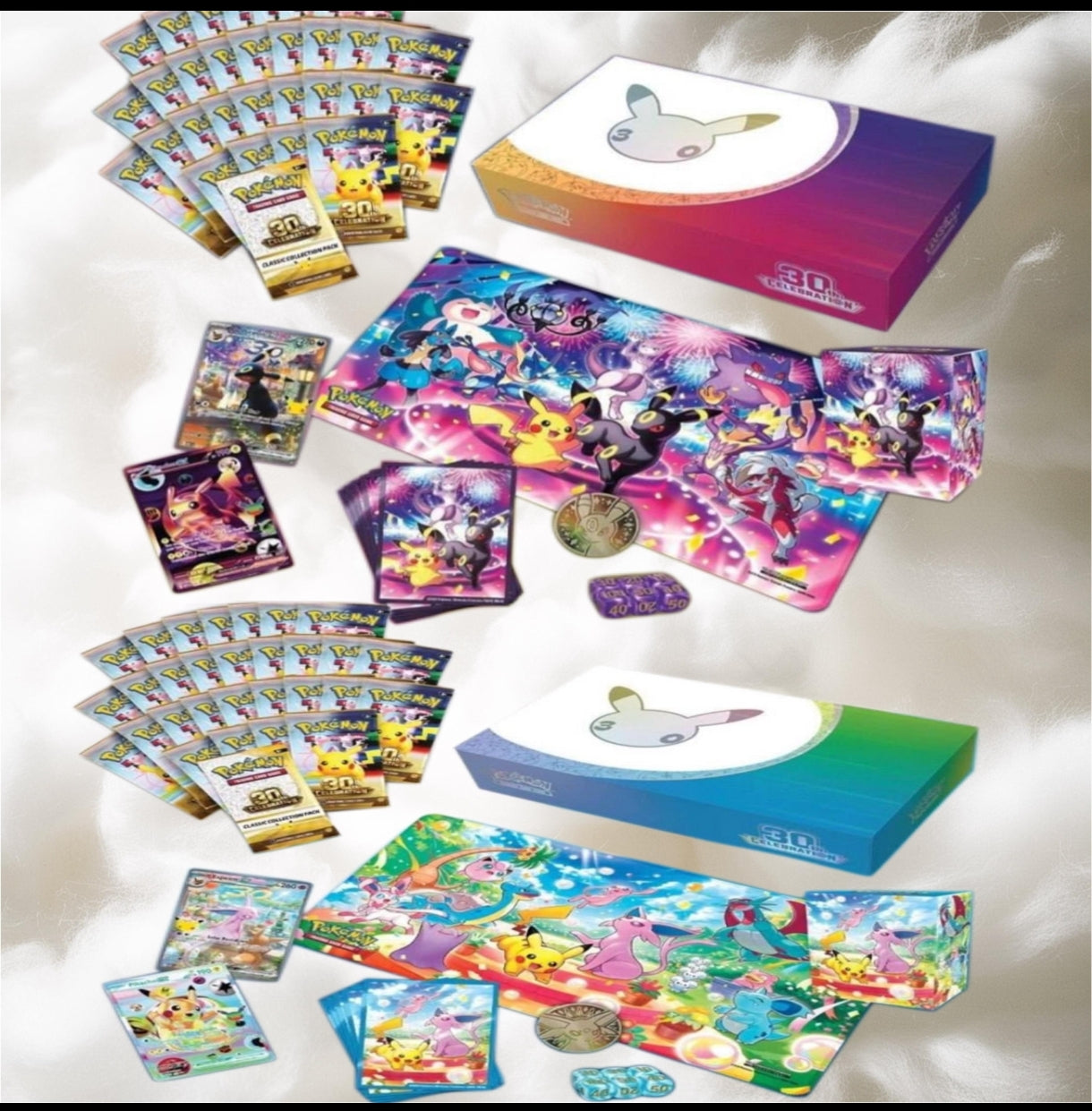 Pokémon Ultra Premium 30th Anniversary Espeon Umbreon collection featuring cards, playmats, and memorabilia.
